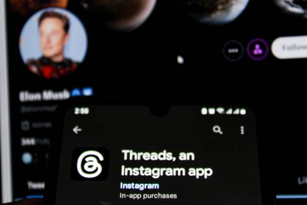 July 7, 2023, Bandung, West Java, Indonesia: In this photo illustration, Threads logo seen displayed on a smartphone and a Twitter logo in the background. Threads is the new social network from Meta Platforms which was launched on the 5th of July 2023. According to Meta CEO Mark Zuckerberg, the Threads app is designed to rival Twitter. As of 6th of July 2023, the Thread app already has 10 million users. Bandung Indonesia - ZUMAs281 20230707_zip_s281_010 Copyright: xAlgixFebrixSugitax