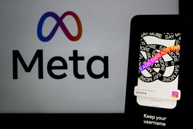 July 7, 2023, Bandung, West Java, Indonesia: In this photo illustration, Threads logo seen displayed on a smartphone and a Meta logo in the background. Threads is the new social network from Meta Platforms which was launched on the 5th of July 2023. According to Meta CEO Mark Zuckerberg, the Threads app is designed to rival Twitter. As of 6th of July 2023, the Thread app already has 10 million users. Bandung Indonesia - ZUMAs281 20230707_zip_s281_011 Copyright: xAlgixFebrixSugitax