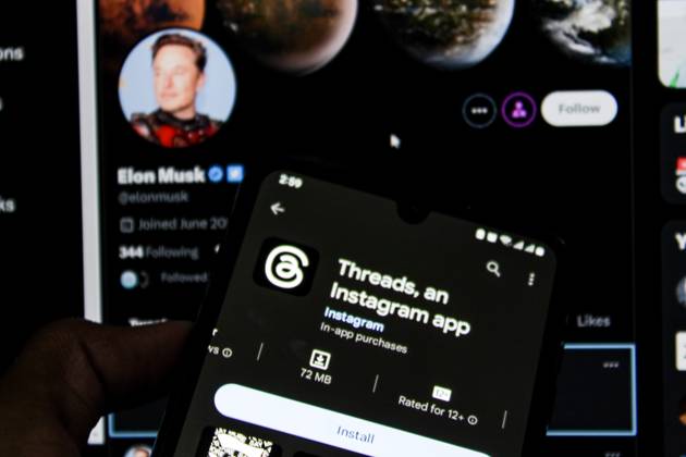 July 7, 2023, Bandung, West Java, Indonesia: In this photo illustration, Threads logo seen displayed on a smartphone and a Twitter logo in the background. Threads is the new social network from Meta Platforms which was launched on the 5th of July 2023. According to Meta CEO Mark Zuckerberg, the Threads app is designed to rival Twitter. As of 6th of July 2023, the Thread app already has 10 million users. Bandung Indonesia - ZUMAs281 20230707_zip_s281_015 Copyright: xAlgixFebrixSugitax