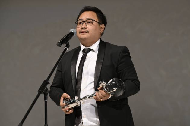 The last day of the 57th Karlovy Vary International Film Festival, July 8, 2023. The director of the film Yoo Ji-yong receives the Proxima Award for his film Conception at the closing ceremony. (CTKxPhoto KaterinaxSulova) CTKPhotoP2023070804853  CTKPhotoP2023070804853