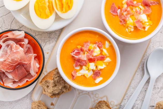 Salmorejo - raw tomato soup with ingredients on a kitchen table Salmorejo - raw tomato soup with ingredients on a kitchen table, spanish cuisine for hot summer Copyright: xZoonar.com IngridxBalabanovax 20479801