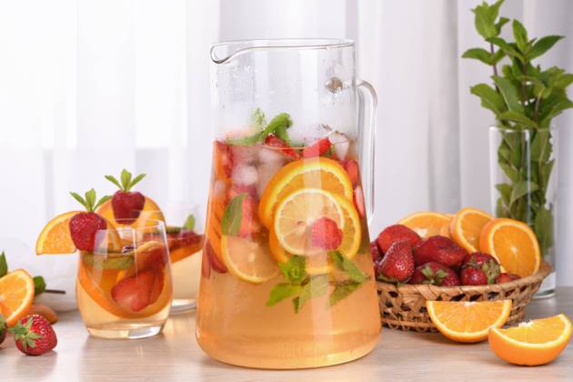 Summer Sangria cocktail Summer Sangria cocktail or lemonade with strawberry, orange and mint. Refreshing organic non-alcoholic, Detox vitaminized healthy drink, fruit in a glass Copyright: xZoonar.com MarynaxVoronovax 20503196