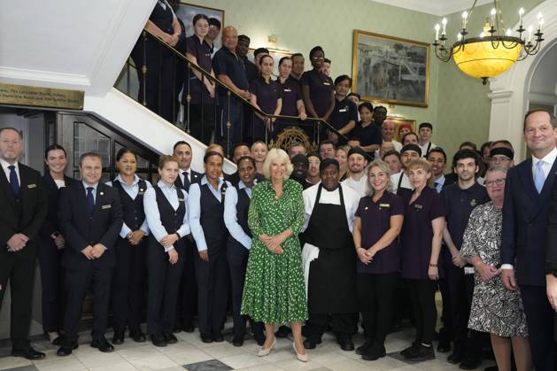 Bilder des Jahres 2023, Entertainment 08 August Entertainment Themen der Woche KW35 Entertainment Bilder des Tages Britain s Queen Camilla poses for a photograph with members of staff at the Royal Air Force Club in London, Tuesday, Aug. 29, 2023. Her Majesty The Queen unveiled a portrait of SOE Operative, Noor-un-Nisa Inayat Khan GC, and formally announced the name of a room in her honour at the Royal Air Force Club., Credit:Kirsty Wigglesworth Avalon GBR, London  Copyright: xKirstyxWigglesworthx xAvalonx 0801085821