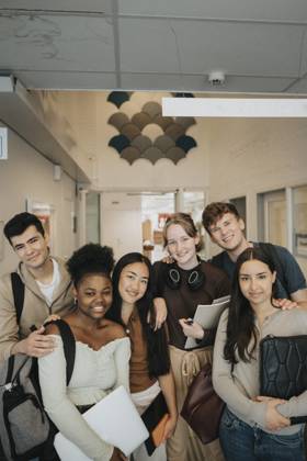 Portrait of happy multiracial male and female students at university Sweden, Gothenburg, model released, property released Copyright: xMaskotx , MA103056 MA103056