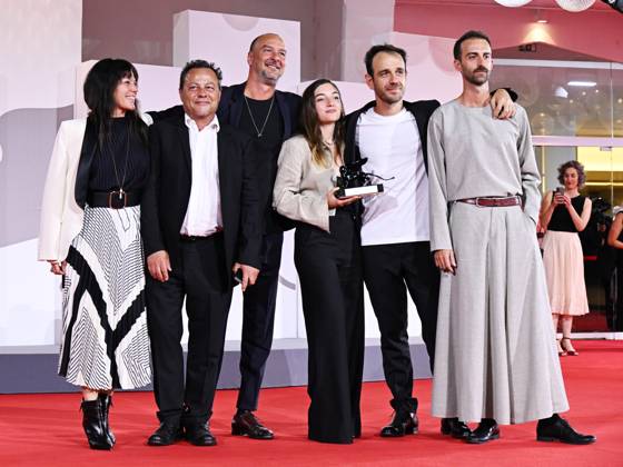 Venice, 80th Venice Film Festival 2023 - evening 11. Red Carpet Awardees In the photo: Erenik Beqiri and guests  Copyright: xManuelexMangiarottix xipa-agencyx xPoolxPhotoxEventsx02x IPA_IPA40183445