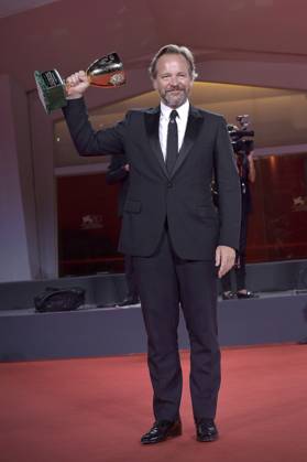 Peter Sarsgaard poses with the Coppa Volpi for Best Actor for the movie Memory during the winner s photocall at the 80th Venice International Film Festival on Saturday, September 9, 2023 in Venice, Italy.  VEN2023090960 RoccoxSpaziani