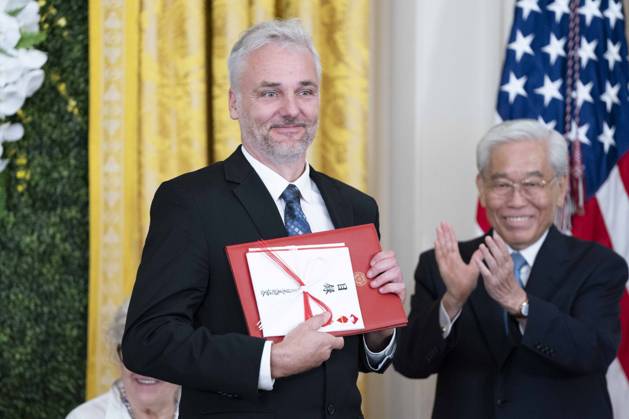 Director for the Rural Studio Andrew Freear receives a diploma as a recipient if the Praemium Imperiale Grant for Young Artists, a program to support young artists work and activities, during an event in the East Room of the White House in Washington, DC on Tuesday, September 12, 2023.  WAP20230912367 BONNIExCASH
