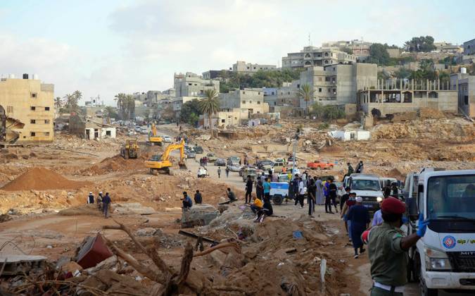 Bilder des Jahres 2023, News 09 September News Themen der Woche KW37 News Bilder des Tages (230917) -- DERNA, Sept. 17, 2023 -- Rescuers work in Derna, Libya, Sept. 16, 2023. On Sept. 10, Mediterranean storm Daniel made landfall in Libya, bringing heavy storms and flash floods along its path in the northeast of the war-torn country and causing extensive damage to residential areas and infrastructure. At least 5,500 people were dead and another 10,000 missing in the disaster, according to the official update on Wednesday. The International Organization for Migration (IOM) said on Friday that more than 38,640 people have been displaced in the most affected areas in northeastern Libya. (Photo by Xinhua) (FOCUS)LIBYA-DERNA-FLOODS-AFTERMATH HamzaxTurkia
