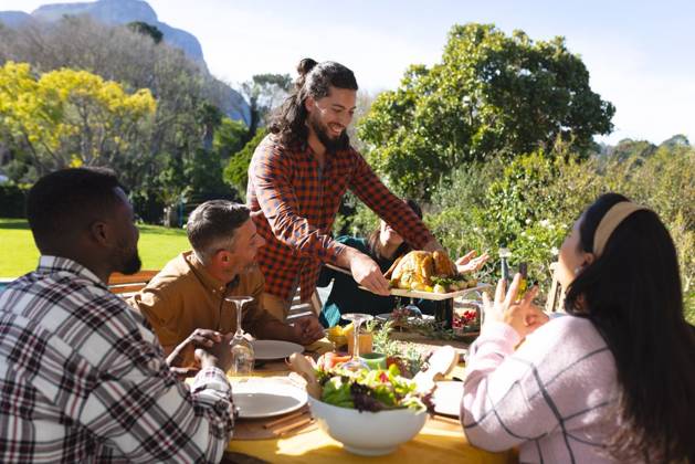 Happy diverse male and female friends serving thanksgiving celebration meal in sunny garden Happy diverse male and female friends serving thanksgiving celebration meal in sunny garden. Celebration, friendship, patriotism, american culture and tradition, unaltered., model released, , property released, Cape Town, South Africa, 07.09.2023, 4193326.jpg, people,happy,diverse,male and female,friend,serving,thanksgiving,celebration,meal,sunny,garden,friendship,patriotism,american culture,tradition,unaltered,holiday,patriotic,dinner,fun,nation,young,lunch,happiness,together,beautiful,spring,summer,party,food,traditional,season,christmas,cheerful,decoration,flag,male,female,american,culture Mature Adult,Man,Male,White,Mid Adult,Woman,Female,Multir