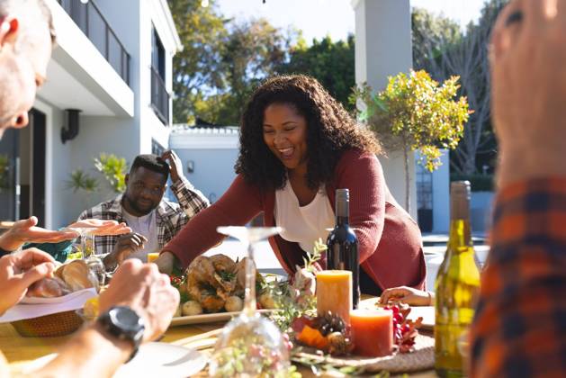 Happy diverse male and female friends serving thanksgiving celebration meal in sunny garden Happy diverse male and female friends serving thanksgiving celebration meal in sunny garden. Celebration, friendship, patriotism, american culture and tradition, unaltered., model released, , property released, Cape Town, South Africa, 07.09.2023, 4193333.jpg, people,happy,diverse,male and female,friend,serving,thanksgiving,celebration,meal,sunny,garden,friendship,patriotism,american culture,tradition,unaltered,holiday,patriotic,dinner,fun,nation,young,lunch,happiness,together,beautiful,spring,summer,party,food,traditional,season,christmas,cheerful,decoration,flag,male,female,american,culture Mid Adult,Woman,Female,African American,Mature Adult,Man,
