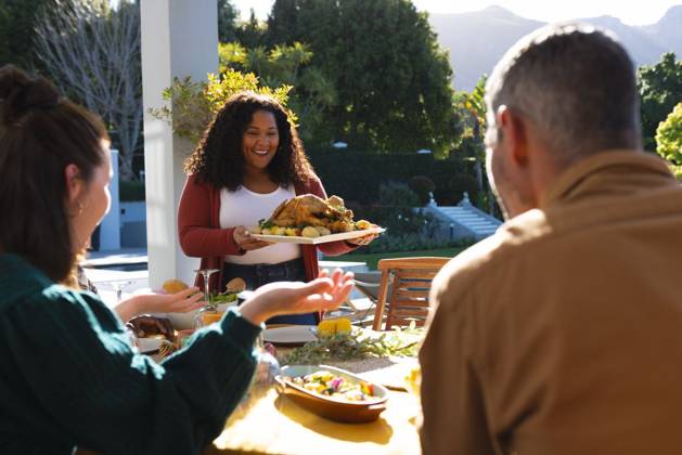 Happy diverse male and female friends serving thanksgiving celebration meal in sunny garden Happy diverse male and female friends serving thanksgiving celebration meal in sunny garden. Celebration, friendship, patriotism, american culture and tradition, unaltered., model released, , property released, Cape Town, South Africa, 07.09.2023, 4193342.jpg, people,happy,diverse,male and female,friend,serving,thanksgiving,celebration,meal,sunny,garden,friendship,patriotism,american culture,tradition,unaltered,holiday,patriotic,dinner,fun,nation,young,lunch,happiness,together,beautiful,spring,summer,party,food,traditional,season,christmas,cheerful,decoration,flag,male,female,american,culture Mid Adult,Woman,Female,African American,Mature Adult,Man,