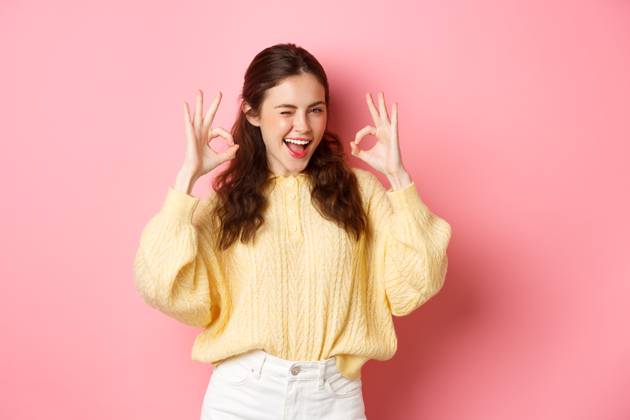 Portrait of cheerful pretty girl winking and saying yes, showing okay sign, alright gesture, praise good job, well done, standing pleased against pink background., model released, , property released, , 39775478.jpg, student, girl, spring, background, okay, good, approve, alright, agree, yes, praise, woman, advertising, fashion, beauty, person, portrait, female, grinning, joy, pink, beautiful, joyful, pleased, positive, smile, stylish, studio, horizontal, young, gesturing, glamour, holiday, excited, shopping, isolated, adult, girlfriend, advertisement, casual, smiling, emotive, slim, upbeat, glamorous, cheerful, emotions, excitement, fashionable, brunette RECORD DATE NOT STATED