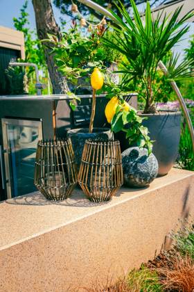 Outdoor kitchen in a garden or terrace with plants and decoration and lantern Outdoor kitchen in a garden or terrace with plants and decoration and lantern Copyright: xZoonar.com IngridxBalabanovax 20529940