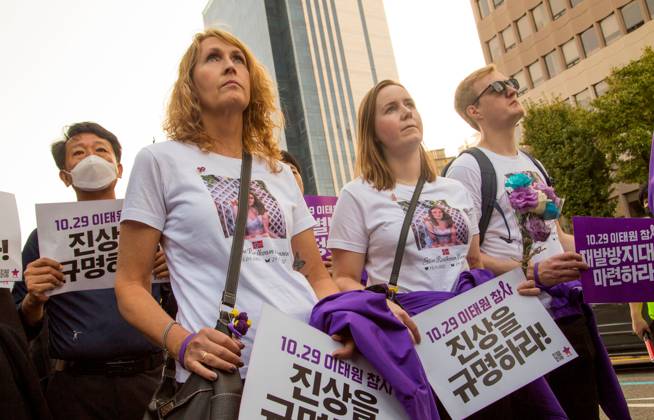 Itaewon tragedy, Oct 29, 2023 : Family members of Stine Roalkvam Evensen from Norway, a victim of the Itaewon crowd crush last year, wear T shirts showing her photo during a protest march at Itaewon street in Seoul, South Korea. Stine Roalkvam Evensen was 20. Thousands of people and family members of the victims gathered in central Seoul to cherish the memories of the deceased at a memorial event marking the first anniversary of the deadly Itaewon crowd crush that claimed 159 lives. They demanded a probe into the disaster and punishment of officials found responsible for the tragedy.  , aflo_234053822.jpg,