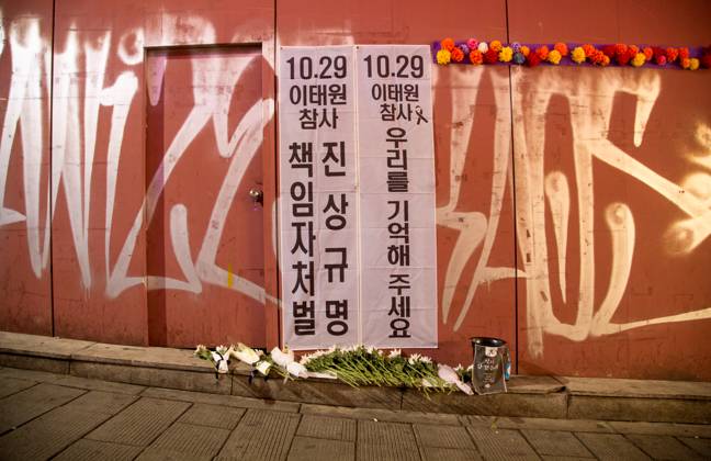Itaewon tragedy, Oct 29, 2023 : Flowers are seen in alleyway, the site of the Itaewon crowd crush during Halloween celebrations last year, in Seoul, South Korea. Thousands of people and family members of the victims gathered in central Seoul on Sunday to cherish the memories of the deceased at a memorial event marking the first anniversary of the deadly Itaewon crowd crush that claimed 159 lives. They demanded a probe into the disaster and punishment of officials found responsible for the tragedy. Placards read, Investigate and punish officials found responsible for the October 29 Itaewon disaster (L) and Remember us .  , aflo_234061662.jpg,