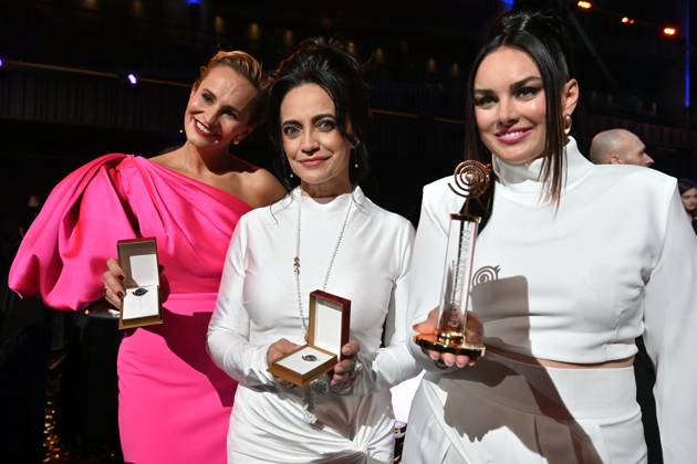Polish-Czech singer Ewa Farna, right, won the female singer category of the Czech Nightingale music poll in Prague, Czech Republic, November 24, 2023. Czech singer Lucie Bila, center, took second place and Monika Absolonova, left, took third place. (CTKxPhoto MichaelaxRihova) CTKPhotoP2023112407949  CTKPhotoP2023112407949