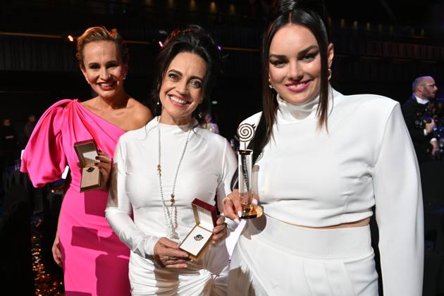 Polish-Czech singer Ewa Farna, right, won the female singer category of the Czech Nightingale music poll in Prague, Czech Republic, November 24, 2023. Czech singer Lucie Bila, center, took second place and Monika Absolonova, left, took third place. (CTKxPhoto MichaelaxRihova) CTKPhotoP2023112407953  CTKPhotoP2023112407953