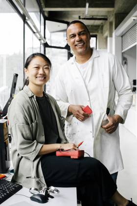 Portrait of happy multiracial male and female technicians at repair shop Germany, Berlin, model released, property released Copyright: xMaskotx , MA105496 MA105496