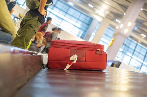 The luggage belt with suitcases being delivered to the passengers at the arrival terminal 22226011 RECORD DATE NOT STATED
