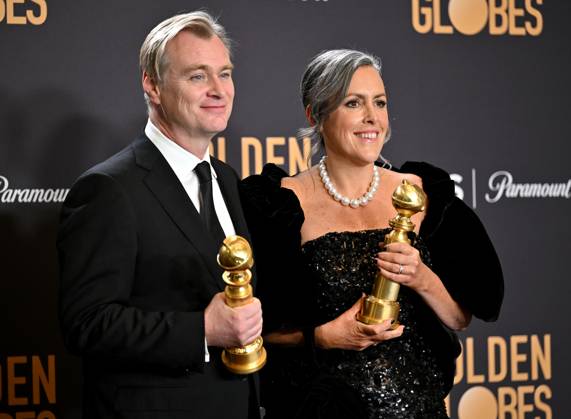 (L-R) Christopher Nolan and Emma Thomas, winners of the Best Motion Picture - Drama for Oppenheimer, during the 81st annual Golden Globe Awards at the Beverly Hilton in Beverly Hills, California on Sunday, January 7, 2024.  LAP202401070350 CHRISxCHEW