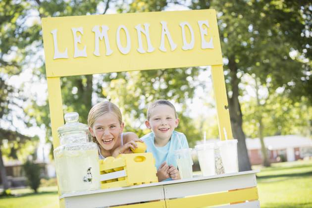 Caucasian brother and sister smiling at lemonade stand Lehi, Utah, USA, 17.09.2014, model released, TTBB_BLD142161.jpg, 4-5 years, 6-7 years, advertising, blonde hair, bonding, booth, boy, boys, brother, capitalism, caucasian, childhood, color image, commerce, consumerism, cup, day, earning, elementary age, enjoying, enterprise, entrepreneur, focus on foreground, food and drink, freshness, friend, front view, girl, girls, glassware, happy, head and shoulders, horizontal, initiative, innocence, leaning, lemon, lemonade, lemonade stand, lifestyle, merchandise, nature, offering, organic, outdoors, people, photography, pitcher, refreshing, retail, selling, sign, sister, small business, smiling, stand, standing, startup, straw, summer, sunny, s Copyright: xMikexKempx