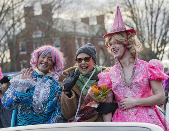 US actress Annette Bening, flanked by Harvard students, waves to the crowd during a parade, through the Harvard Yard in her honor, as she is named the Harvard University s Hasty Pudding Theatricals 2024 Woman of the Year in Cambridge, MA on Tuesday, February 06, 2024.  BOS20240206024 AmandaxSabga