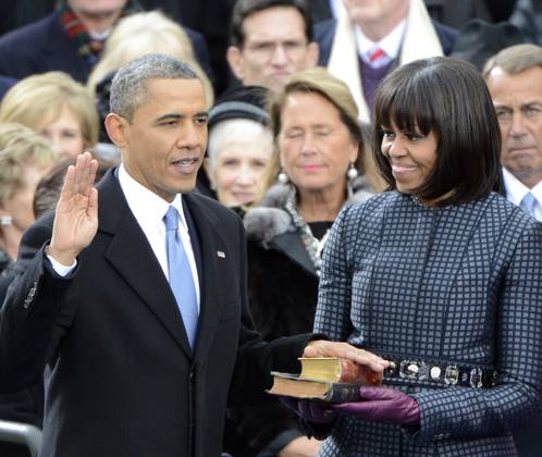 Obama Public Inauguration United States President Barack Obama takes the oath of office during the public swearing-in ceremony at the U.S. Capitol in Washington, D.C. on Monday, January 21, 2013..Credit: Ron Sachs CNP.(RESTRICTION: NO New York or New Jersey Newspapers or newspapers within a 75 mile radius of New York City) Washington District of Columbia United States of America EDITORIAL USE ONLY Copyright: xx _AS00015 RonxSachsx cnpphotos042718
