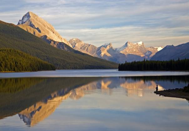 Male fly fisherman at Maligne Lake, Jasper National Park, Alberta, Canada.  Copyright: x xAllxCanadaxPhotosx 1990-75163