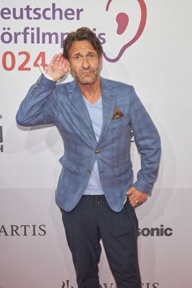 Falk-Willy Wild - Verleihung des 22.Deutschen Hoerfilmpreis 2024 in der Hauptstadtrepraesentanz der Deutschen Telekom in Berlin am 19.03.2024. 22. Deutscher Hoerfilmpreis 2024