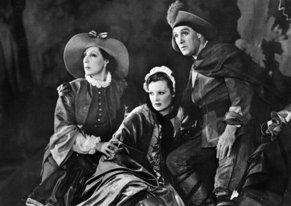 AS YOU LIKE IT. Edith Evans as Rosalind, Eileen Peel as Celia, and Milton Rosmer as Touchstone in William Shakespeare s As You Like It at the Old Vic Theater, London, England, 1936.  Copyright: xGRANGERx xGRANGERx 0039684