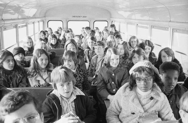 DESEGREGATION: BUSING, 1973. Black and white students from the suburbs of Charlotte, North Carolina, riding on a school bus to an inner city school, 21 February 1973. Photographed by Warren K. Leffler.  Copyright: xGRANGERx xGRANGERx 0264465