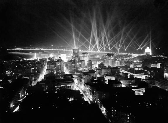 SAN FRANCISCO: NIGHT, 1936. Searchlights on the horizon of San Francisco, California, possibly in celebration of the opening of the Bay Bridge. Photograph, 30 November 1936.  Copyright: xGRANGERx xGRANGERx 0640145