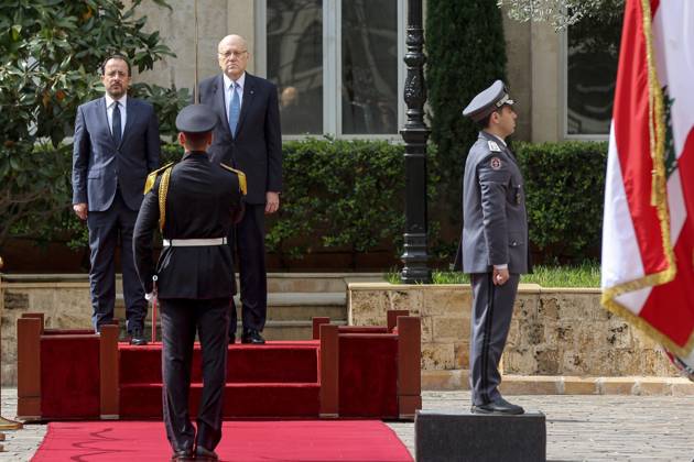 April 8, 2024, Beirut, Beirut, Lebanon: Lebanese Prime Minister NAJIB MIKATI (R) and Cypriot President NIKOS CHRISTODOULIDES (L) review troops of honor upon his arrival at Beirut governmental Palace. Christodoulides arrived in Beirut for talks with officials for possible solutions for the incessant flow of displaced Syrians to the island from the Lebanese coast. Beirut Lebanon - ZUMAn313 20240408_zip_n313_004 Copyright: xMarwanxNaamanix