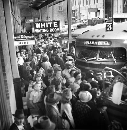 February 26, 2024, Memphis, Tennessee, USA: Crowded bus terminal with White Waiting Room sign in foreground and Colored Waiting Room in background, Memphis, Tennessee, USA, Esther Bubley, U.S. Office of War Information, September 1943 Memphis USA - ZUMAg145 20240226_zap_g145_002 Copyright: xJTxVintagex
