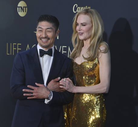 Nicole Kidman and Brian Tee attend the 49th AFI Lifetime Achievement Award tribute gala honoring Kidman at the Dolby Theatre in the Hollywood section of Los Angeles on Saturday, April 27, 2024.  LAP2024042735 JIMxRUYMEN