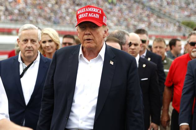 CHARLOTTE, NC - MAY 26: Former President of the United States of America Donald Trump on pit road prior to the running of the NASCAR Cup Series Coca-Cola 600 on May 26, 2024 at Charlotte Motor Speedway in Charlotte, NC. (Photo by Jeff Robinson Icon Sportswire) EDITORIAL USE ONLY Icon1045686806