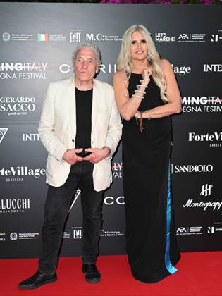 Cagliari: Santa Margherita di Pula, Cagliari, 7th edition of the Filming Italy Sardinia Festival, Red Carpet awards ceremony in the early evening. In the photo: Abel Ferrara Tiziana Rocca Cagliari  - ZUMAp169 20240621_zea_p169_091 Copyright: xIPAx