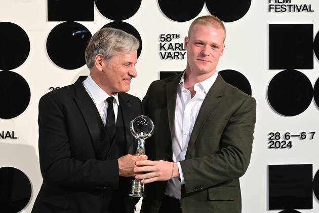 American actor Viggo Mortensen, left, received the President s Award during the opening ceremony of the 58th Karlovy Vary International Film Festival was held on June 28, 2024, in Karlovy Vary, Czech Republic. On the right side is seen British actor Solly McLeod. (CTKxPhoto SlavomirxKubes) CTKPhotoP2024062808378  CTKPhotoP2024062808378