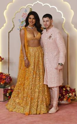 Wedding red carpet of Anant Ambani & Radhika Merchant in Mumbai, India - 12 Jul 2024 Bollywood actress Priyanka Chopra (L) pose for a photo with her husband, singer, songwriter and actor Nick Jonas (R) on the red carpet wedding ceremony of Anant Ambani and Radhika Merchant in Mumbai. Mumbai India Copyright: xAshishxVaishnavx xSOPAxImagesx AVaishnav_Wedding red carpet of Anant Ambani _ Radhika Merchant in Mumbai, India (25)