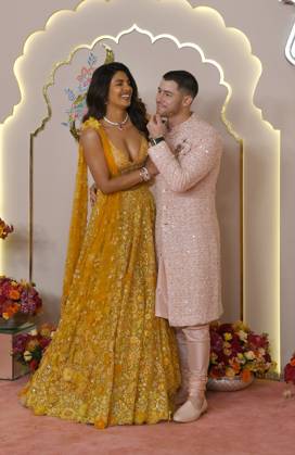 Wedding red carpet of Anant Ambani & Radhika Merchant in Mumbai, India - 12 Jul 2024 Bollywood actress Priyanka Chopra (L) share a candid moment with her husband, singer, songwriter and actor Nick Jonas (R) on the red carpet wedding ceremony of Anant Ambani and Radhika Merchant in Mumbai. Mumbai India Copyright: xAshishxVaishnavx xSOPAxImagesx AVaishnav_Wedding red carpet of Anant Ambani _ Radhika Merchant in Mumbai, India (26)