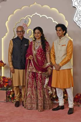 Wedding red carpet of Anant Ambani & Radhika Merchant in Mumbai, India - 12 Jul 2024 Bollywood actress Juhi Chawla (C) pose for a photo with her husband Jay Mehta (L) and son Arjun Mehta (R) on the red carpet wedding ceremony of Anant Ambani and Radhika Merchant in Mumbai. Mumbai India Copyright: xAshishxVaishnavx xSOPAxImagesx AVaishnav_Wedding red carpet of Anant Ambani _ Radhika Merchant in Mumbai, India (43)