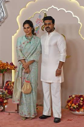 Wedding red carpet of Anant Ambani & Radhika Merchant in Mumbai, India - 12 Jul 2024 Indian actor, producer and entrepreneur Ramcharan pose for a photo with his wife Upasana Kamineni on the red carpet wedding ceremony of Anant Ambani and Radhika Merchant in Mumbai. Mumbai India Copyright: xAshishxVaishnavx xSOPAxImagesx AVaishnav_Wedding red carpet of Anant Ambani _ Radhika Merchant in Mumbai, India (45)
