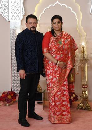 Wedding red carpet of Anant Ambani & Radhika Merchant in Mumbai, India - 12 Jul 2024 Former Member of Rajya Sabha, Smriti Irani pose for a photo with her husband Zubin Irani (L) on the red carpet wedding ceremony of Anant Ambani and Radhika Merchant in Mumbai. Mumbai India Copyright: xAshishxVaishnavx xSOPAxImagesx AVaishnav_Wedding red carpet of Anant Ambani _ Radhika Merchant in Mumbai, India (49)