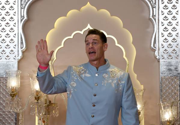 Wedding red carpet of Anant Ambani & Radhika Merchant in Mumbai, India - 12 Jul 2024 American actor and professional wrestler John Cena waves to the media as he poses for a photo on the red carpet wedding ceremony of Anant Ambani and Radhika Merchant in Mumbai. Mumbai India Copyright: xAshishxVaishnavx xSOPAxImagesx AVaishnav_Wedding red carpet of Anant Ambani _ Radhika Merchant in Mumbai, India (5)