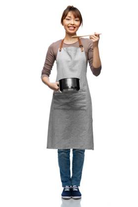 culinary and people concept - happy smiling female chef in jacket with saucepan cooking food over grey background. happy smiling female chef with saucepan ,model released, Symbolfoto