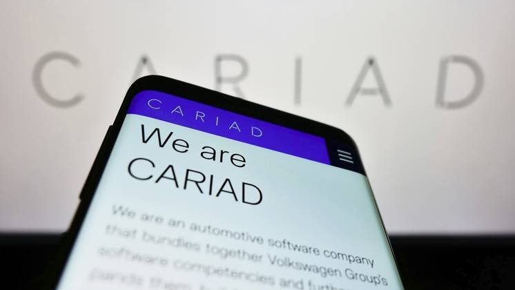 Stuttgart, Germany, 10-15-2022: Mobile phone with website of German automotive software company Cariad SE on screen in front of business logo. Focus on top-left of phone display, Europe Copyright: imageBROKER TimonxSchneider ibliqx10698853.jpg