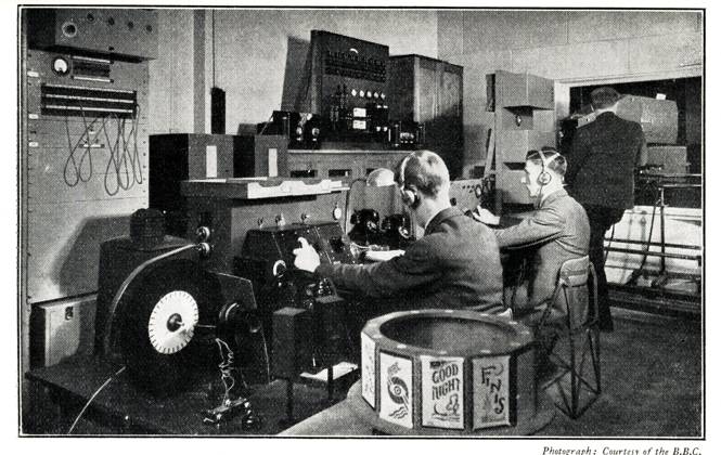 RECORD DATE NOT STATED BBC Late Low Definition Television Control Room BBC Late Low Definition Television Control Room. On the right is the mirror-drum projection scanner, on the left are the two checking receivers. The engineers in position (R to L) are projectionist, vision-control, sound and caption control. The BBC tuning in design can be seen in the transmitter (caption) drum in the foreground. Date: 1937  Copyright: Copyrightx(c)Geminix2023.xCredit:xGemini 13463380