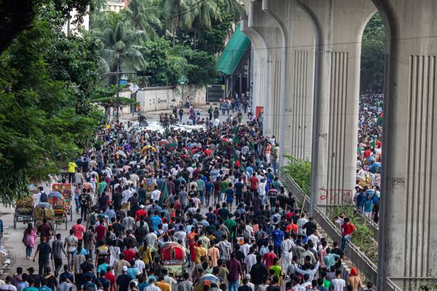 August 5, 2024, Dhaka, Bangladesh: Anti-government protestors participate in the celebrations. Thousands of people are celebrating the resignation of Bangladeshi Prime Minister Sheikh Hasina..Protests in Bangladesh that began as student-led demonstrations against government hiring rules in July culminated on August 5, in the prime minister fleeing and the military announcing it would form an interim government. Dhaka Bangladesh - ZUMAs197 20240805_aaa_s197_084 Copyright: xSazzadxHossainx