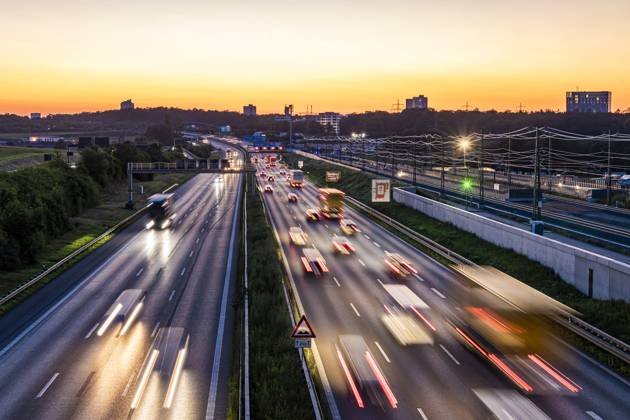 Germany, Baden-Wurttemberg, Stuttgart, Traffic on Bundesautobahn 8 at dusk, WDF07674