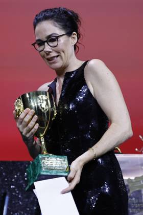September 7, 2024, Venice, ITALY: Dutch director Halina Reijn acknowledges receiving on behalf of Australian actor Nicole Kidman the Volpi Cup (Coppa Volpi) Award for Best Actress for her performance in the movie Babygirl during the closing ceremony of the 81st annual Venice International Film Festival, in Venice, Italy, 07 September 2024. ANSA FABIO FRUSTACI Venice ITALY  - ZUMAa110 20240907_zaf_a110_113 Copyright: xFabioxFrustacix